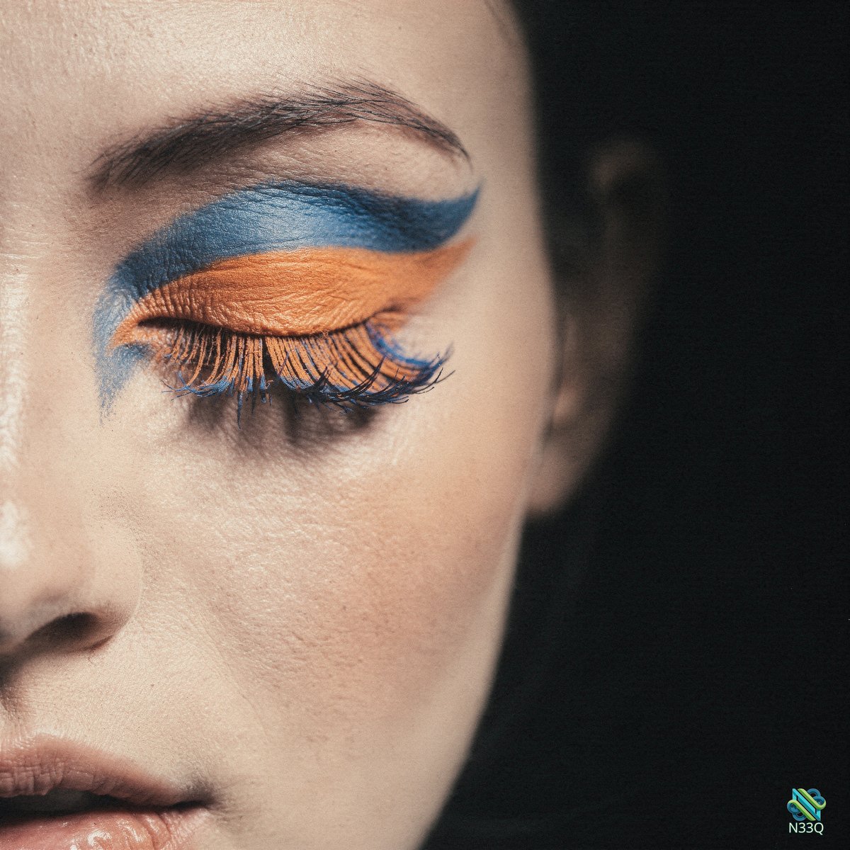 Close-Up of Blue and Orange Eye Makeup