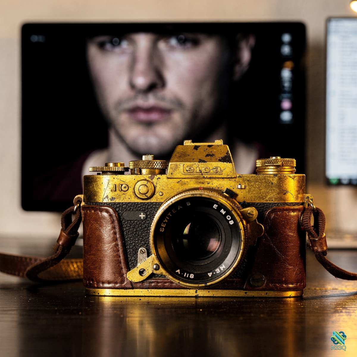 Weathered Gold Vintage Camera on Desk