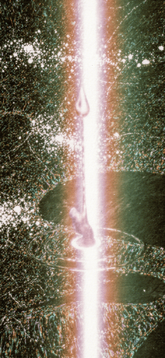 Cosmic Light Portal with Falling Droplets