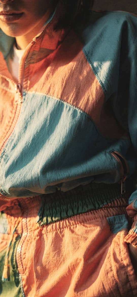 Woman in Colorful Retro Windbreaker Jacket