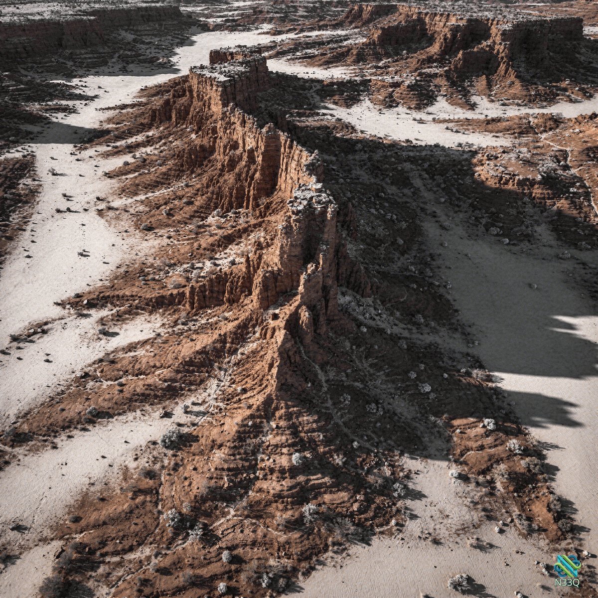 Eroded Rock Spire in Desert Canyon