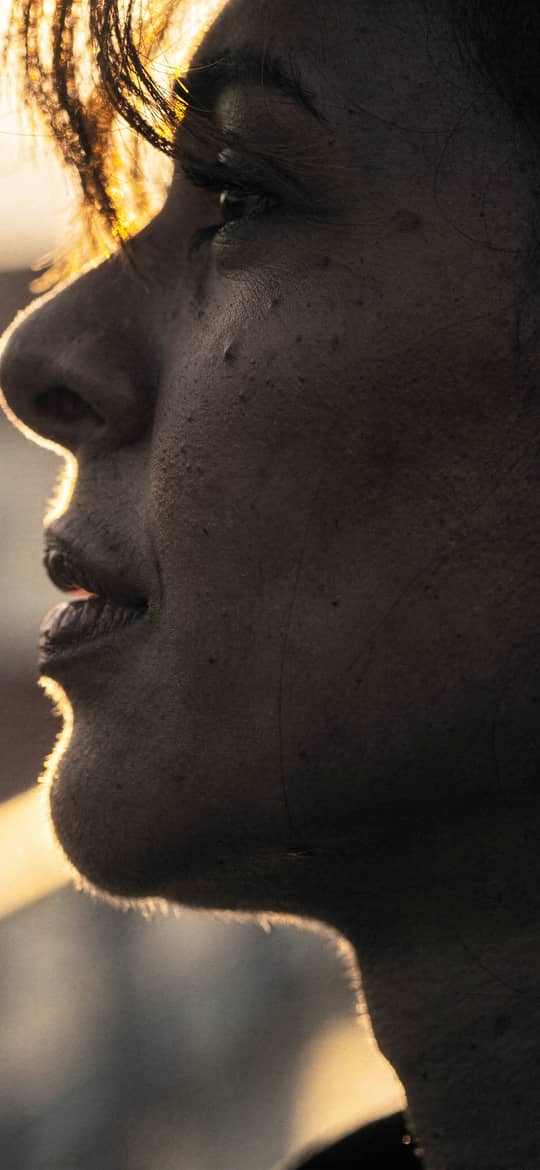 Woman in Golden Hour Sunlight Profile