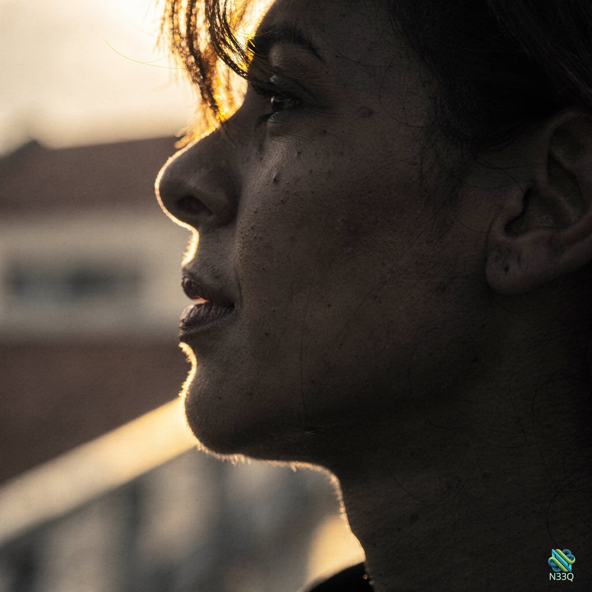 Woman in Golden Hour Sunlight Profile