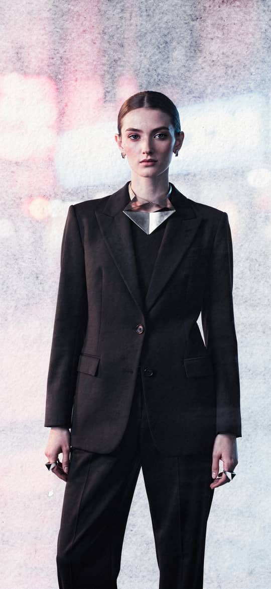 Woman in Dark Pantsuit at Night