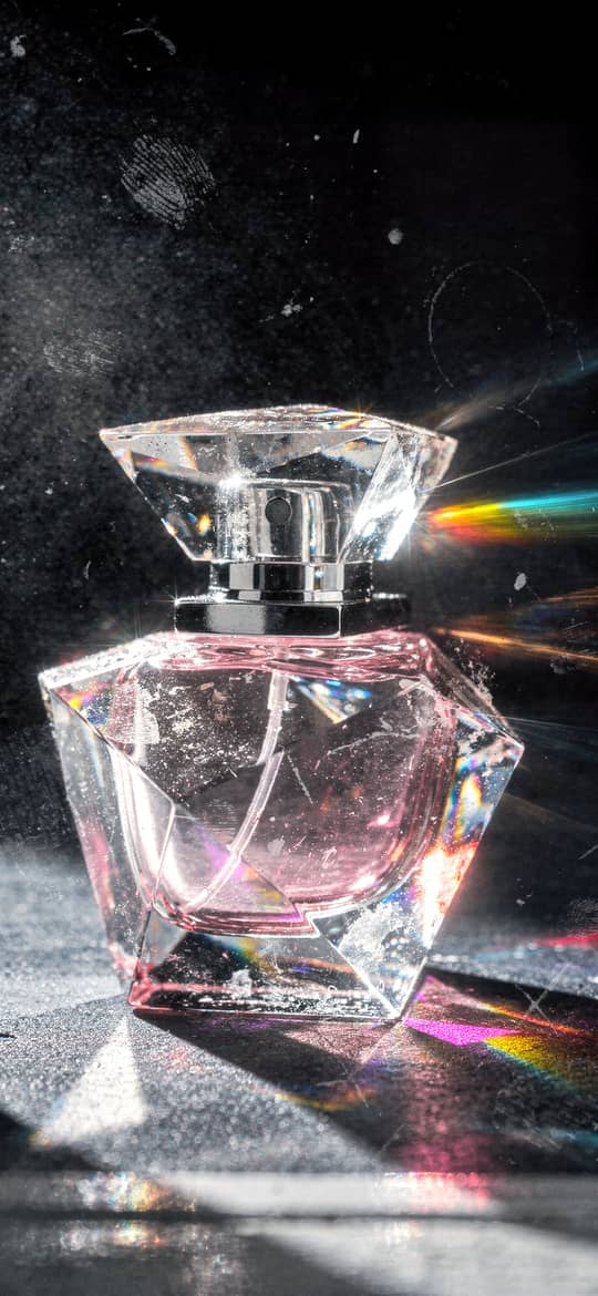 Faceted Crystal Perfume Bottle with Pink Liquid