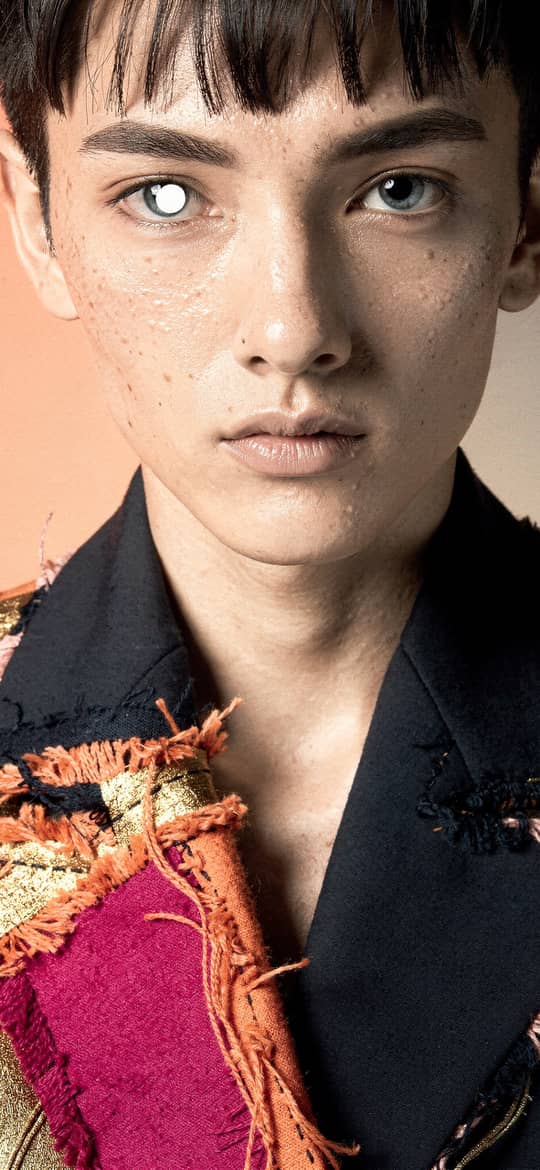 Freckled Youth in Patchwork Fashion Jacket