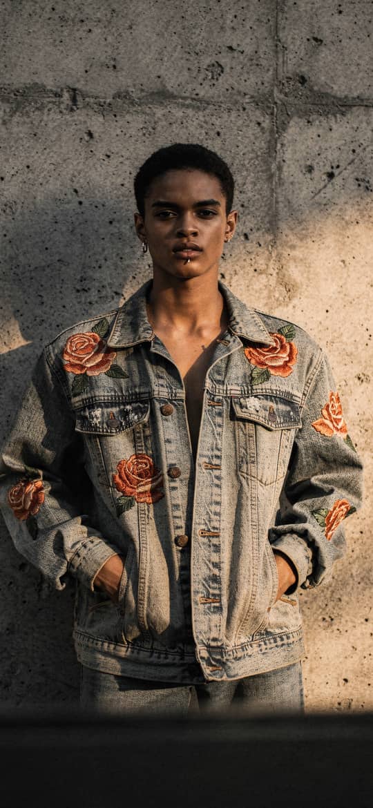 Young Man in Rose Embroidered Denim Jacket