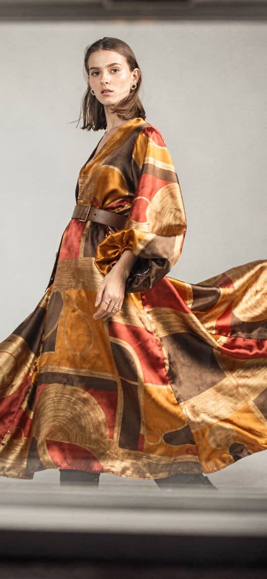 Woman in Swirling Geometric Patterned Dress